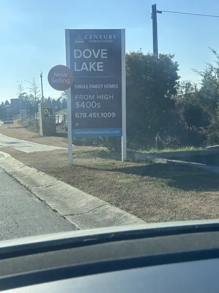 A welcoming entrance sign for single-family homes at Dove Lake by Century Communities in Grayson, GA.