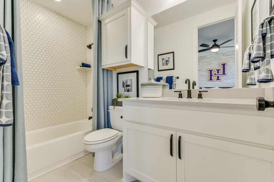 Furnished interior in a model home at Clearwater Ranch in Liberty Hill (Image 60).