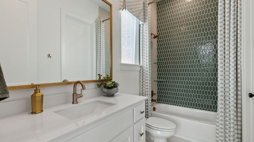 Furnished interior in a model home at Windsong Ranch 71' Series in Prosper (Image 13).