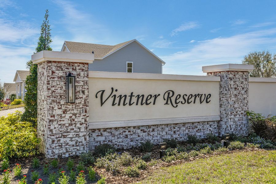 Entrance to the Vintner Reserve community in Clermont, FL, featuring signage and landscaping (Image 1).