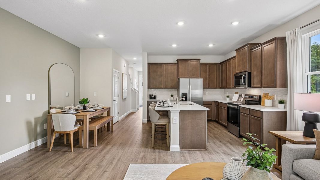 Furnished interior in a model home at Sanctuary at Citrus Park Townhomes in Tampa (Image 11).