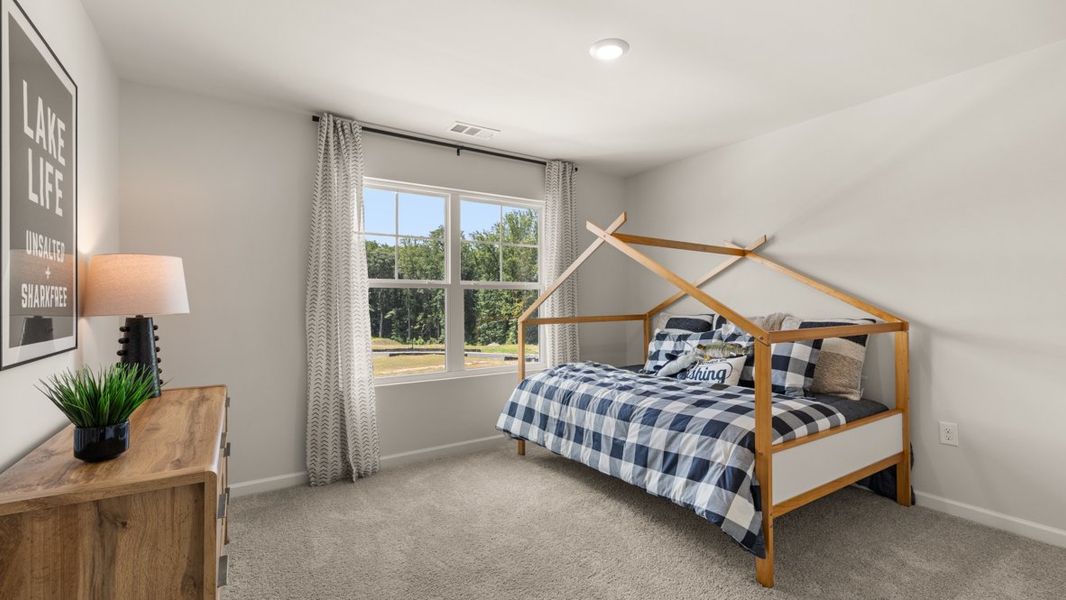 Furnished interior in a model home at Grandview at Lanier in Dawsonville (Image 26).