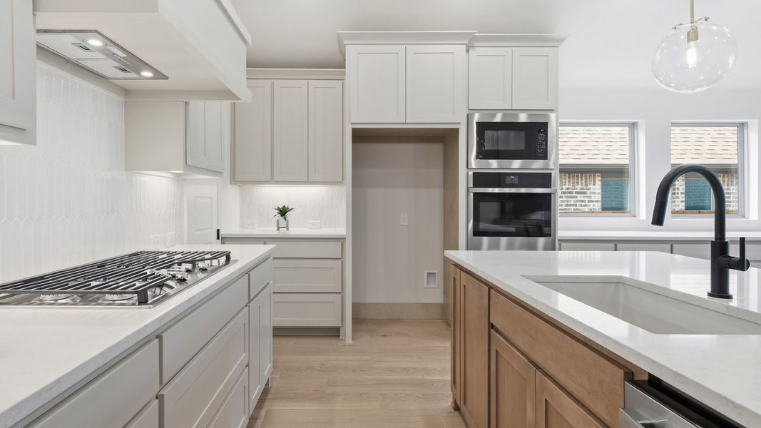Furnished interior in a model home at Canyon Falls 50' in Northlake (Image 11).