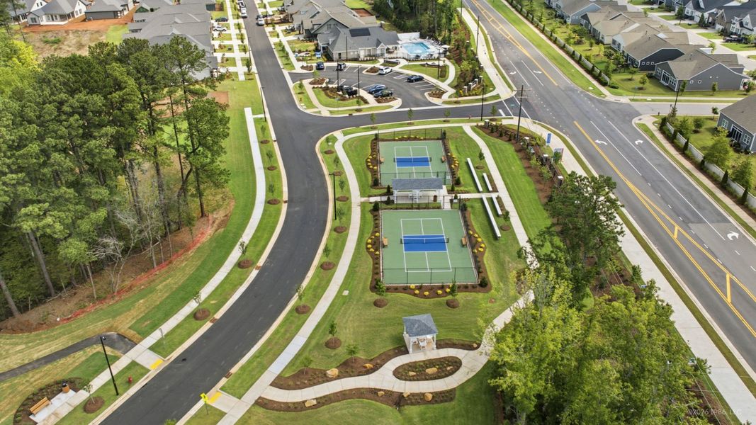 Aerial view of the The Courtyards at Oak Grove community in Durham, NC, showing layout and nearby surroundings (Image 12). Aerial view of the The Courtyards at Oak Grove community in Durham, NC, showing layout and nearby surroundings (Image 12).