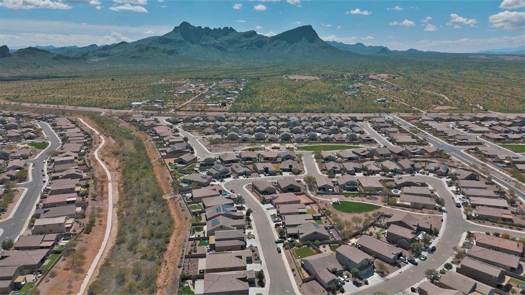 Aerial view of the Saguaro Bloom community in Marana, AZ, showing layout and nearby surroundings (Image 1).
