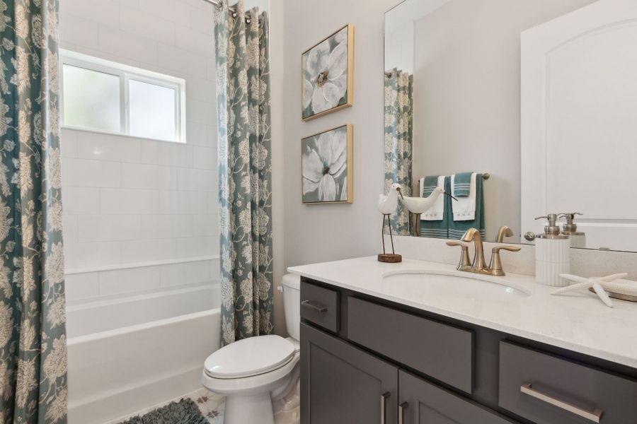 Furnished interior in a model home at Katie Cove in Jacksonville (Image 22).