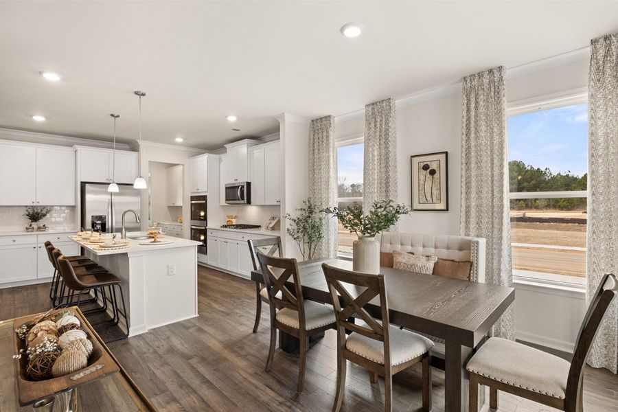 Furnished interior in a model home at Westland in Bogart (Image 6).