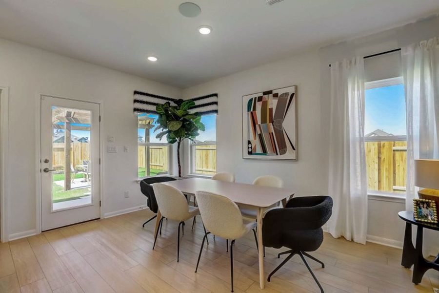 Furnished interior in a model home at Village at Three Oaks in Seguin (Image 19).