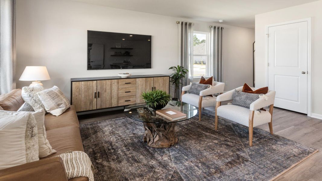 Furnished interior in a model home at Grayson Park Townhomes in Leland (Image 12).