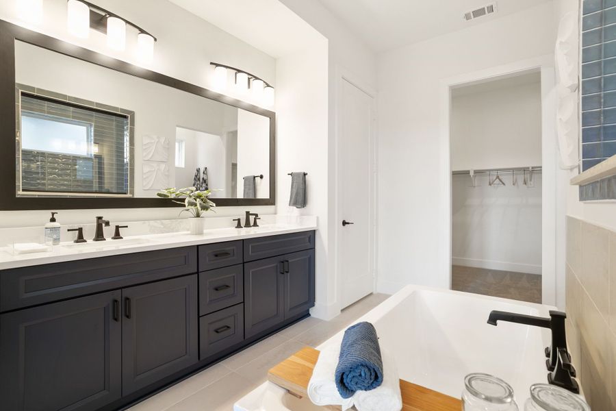 Furnished interior in a model home at Lily Creek at Sutton Fields in Aubrey (Image 79).