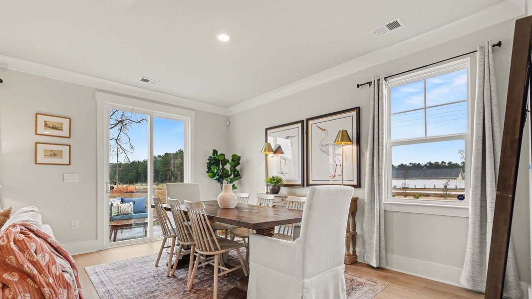 Furnished interior in a model home at Chapman Village in Conway (Image 4).