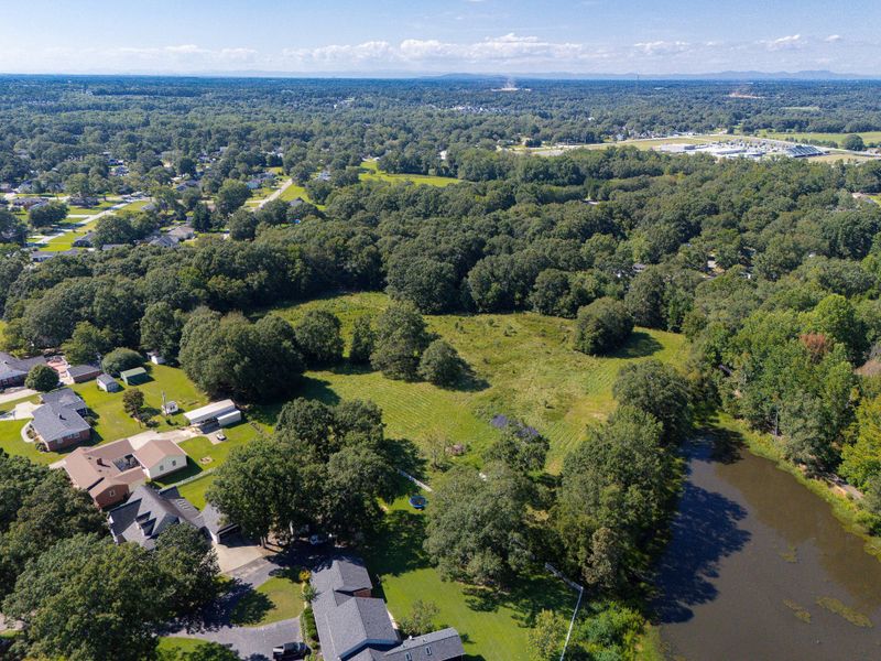 Aerial view of the Fountain Grove community in Fountain Inn, SC, showing layout and nearby surroundings (Image 9).