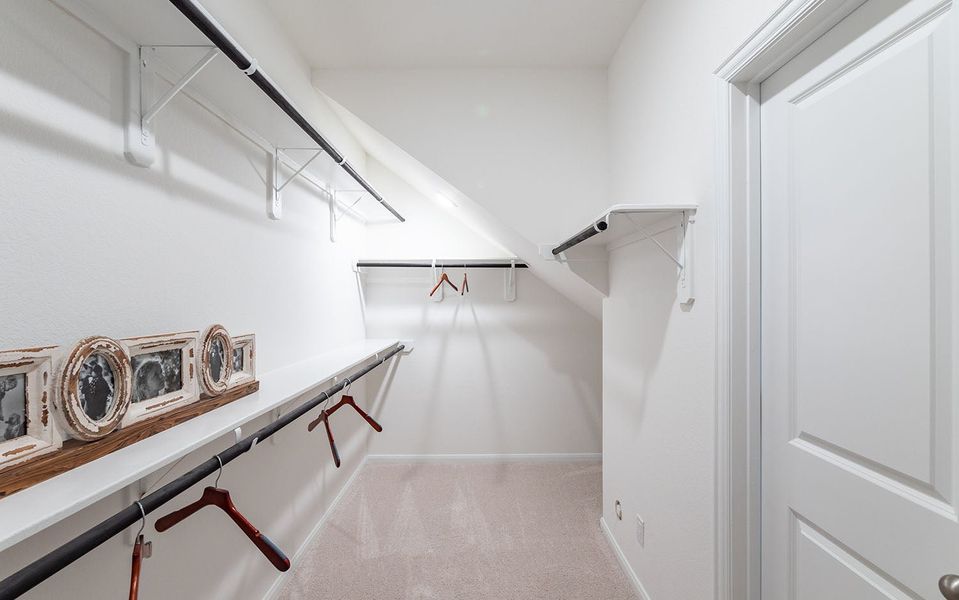 Furnished interior in a model home at Infinity Square in Kyle (Image 9).