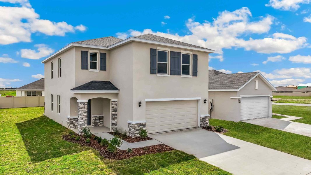 Front exterior of a home in the Seaire community, located in Parrish, FL (Image 3).