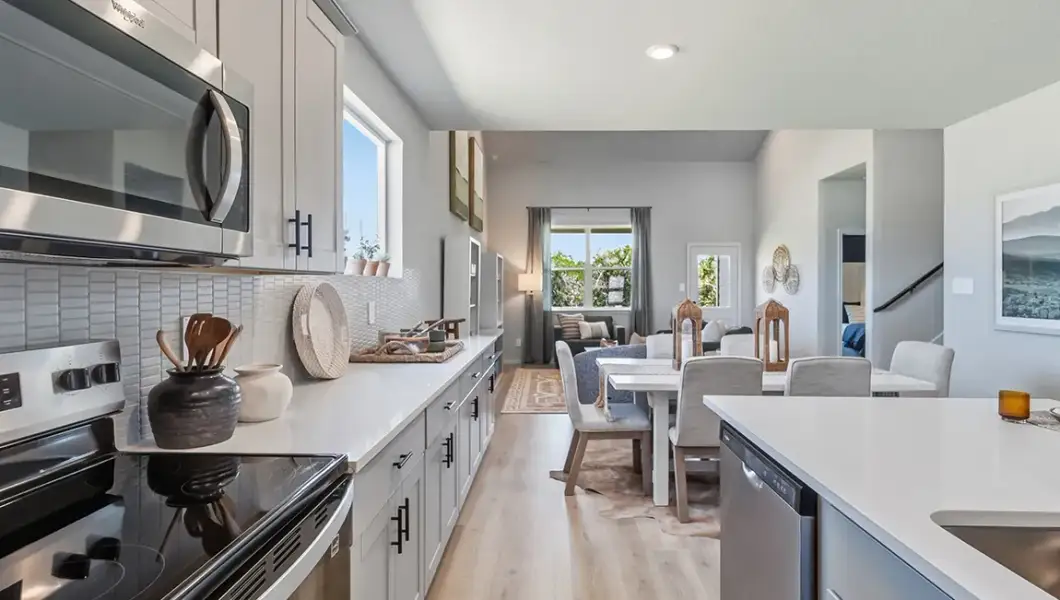 Furnished interior in a model home at The Woodlands at Medina Hills in Mico (Image 25).