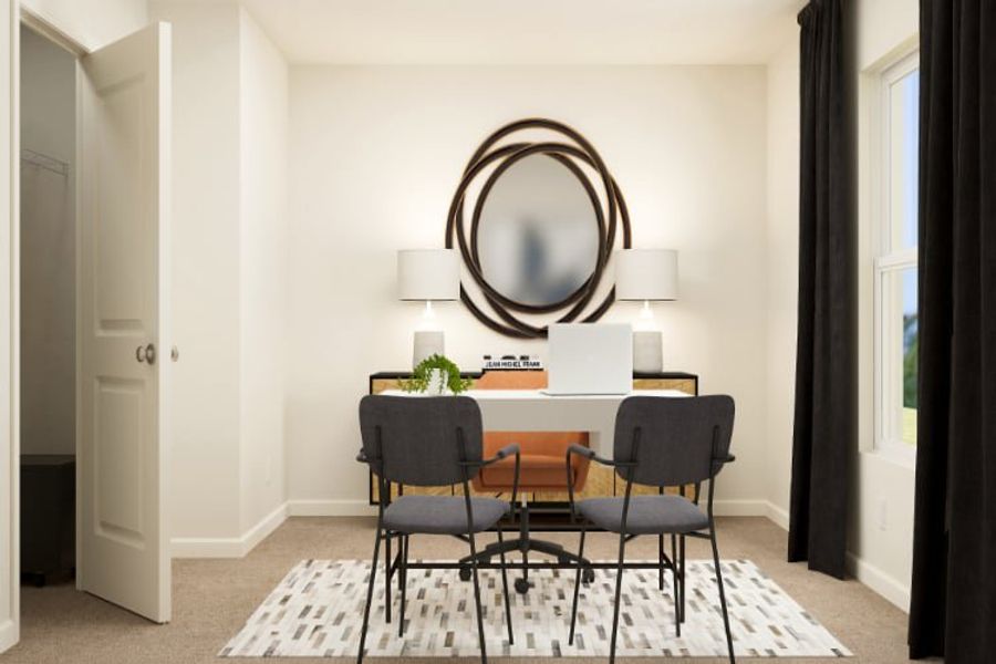 A dining room table with chairs.