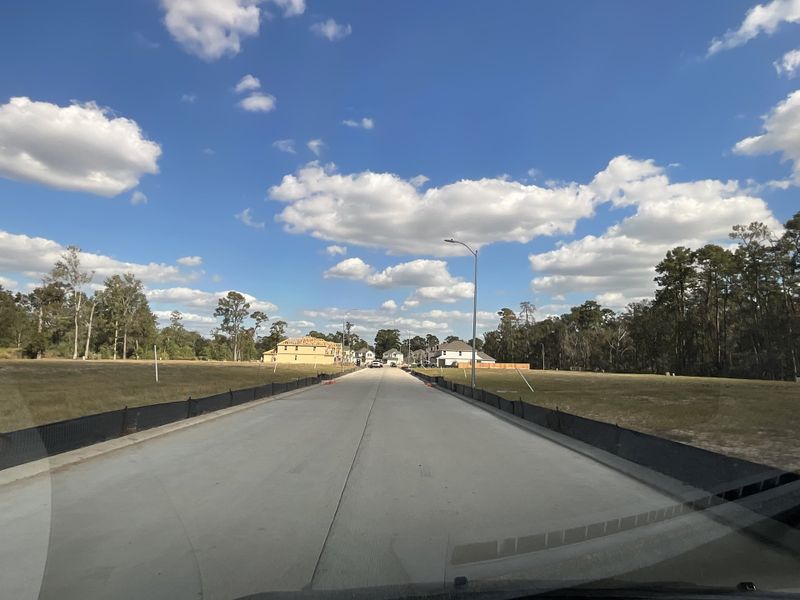 Developing neighborhood with new homes under construction in Cypresswood Point by Long Lake Ltd. (Humble, TX).
