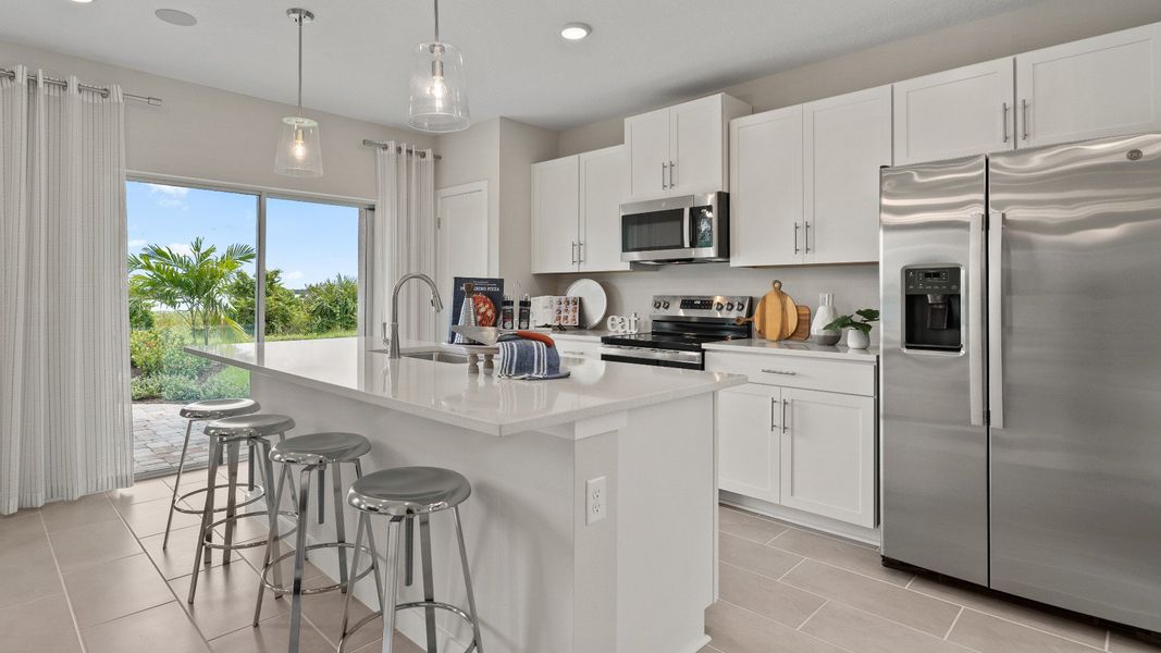 Coastal Kitchen in New Single Family Homes in New Smyrna Beach Ardisia Park DRB Homes.