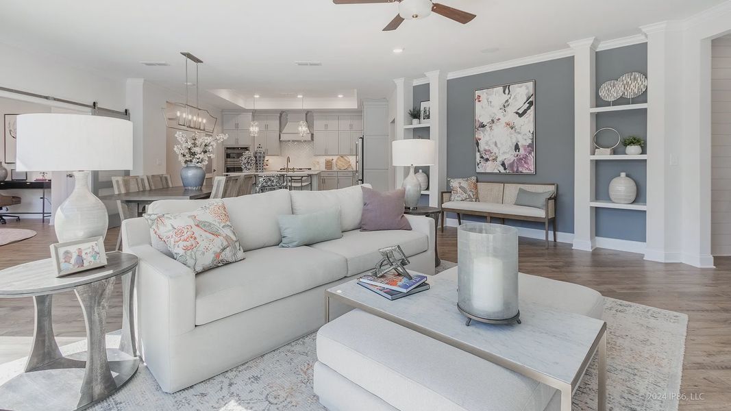 Furnished interior in a model home at The Courtyards at Redbud Lane in Holly Springs (Image 18).