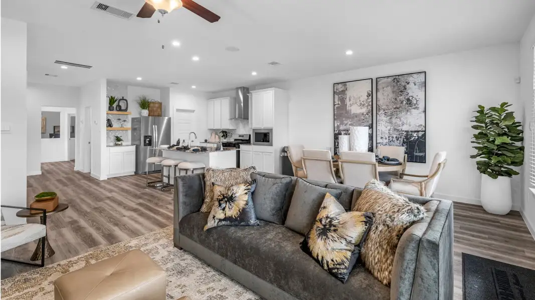 Furnished interior in a model home at Alexander Townhomes in Pearland (Image 14).