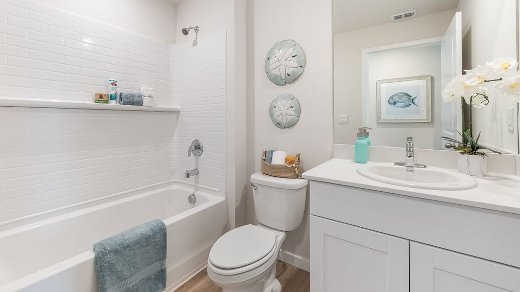 Furnished interior in a model home at Cali Cove in Punta Gorda (Image 22).