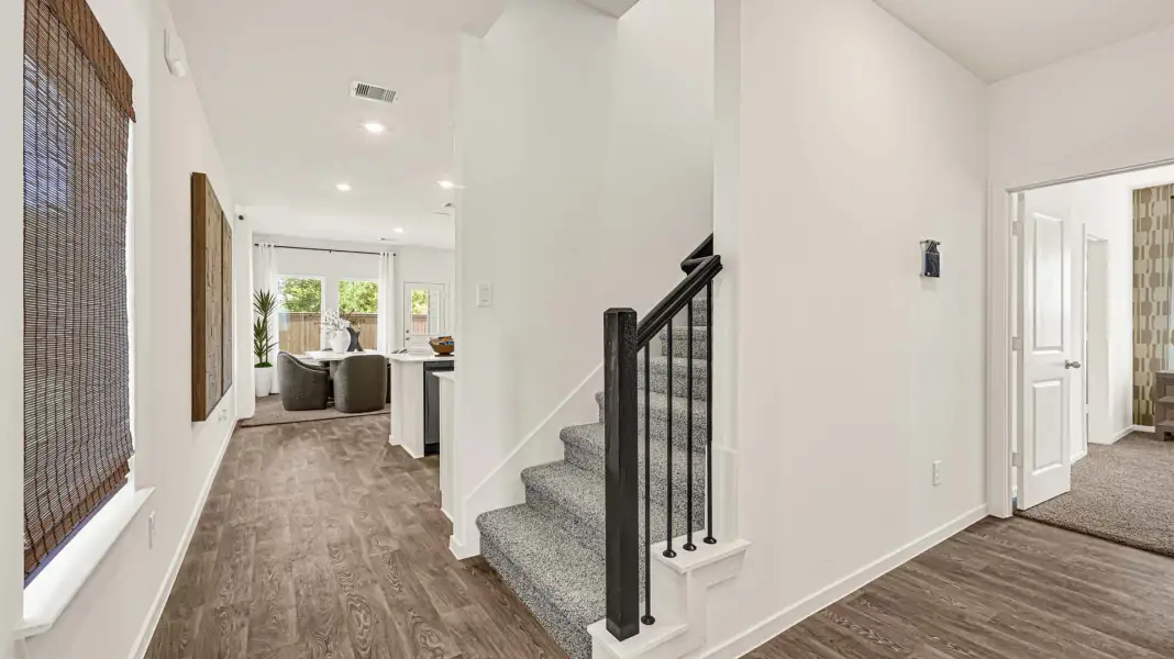 Furnished interior in a model home at Reverie Ranch in Arcola (Image 5).