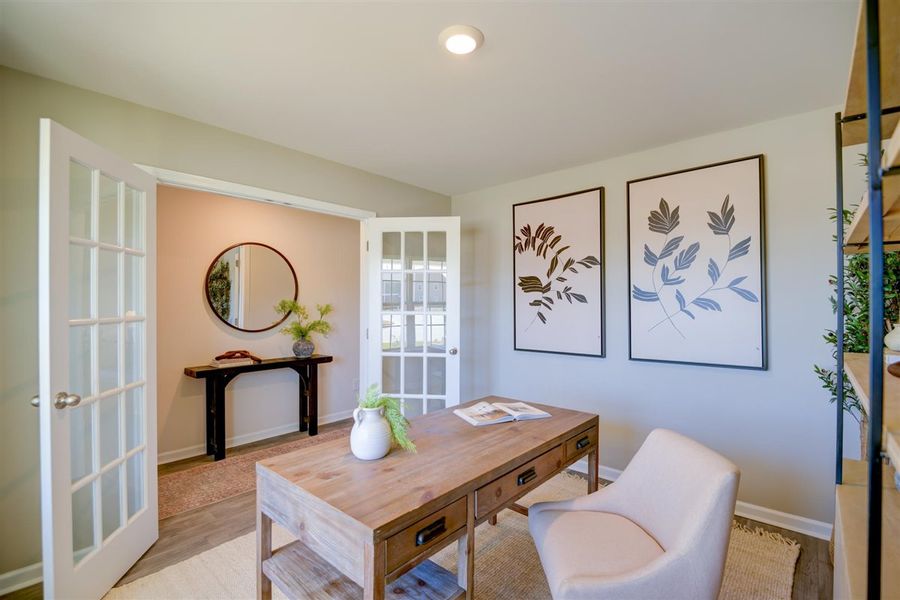 Furnished interior in a model home at Corinth Village in Greensboro (Image 24).