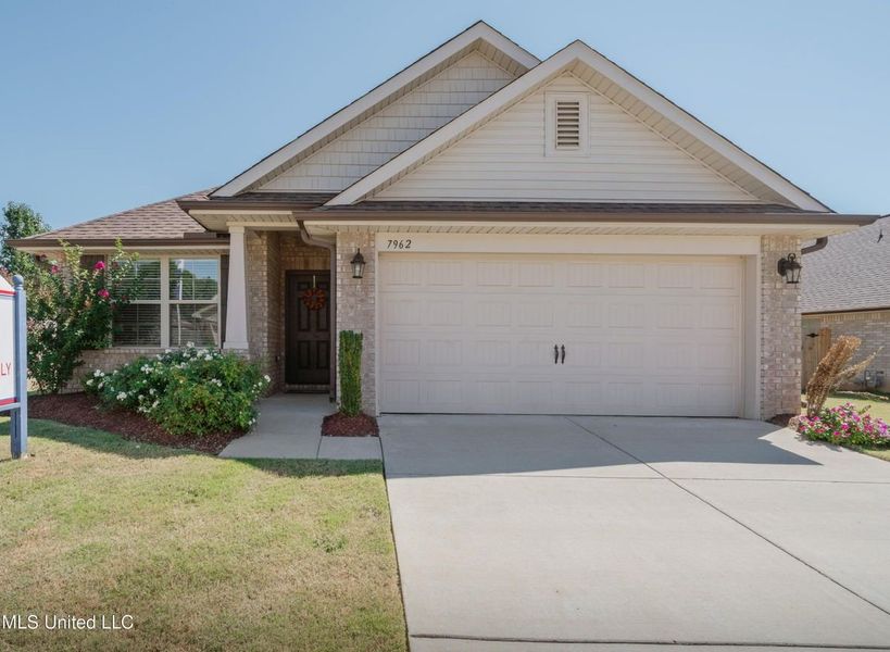 Front exterior of a home in the Hidden Pines community, located in Milton, FL (Image 1).