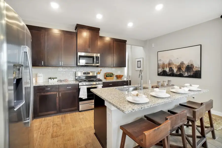 Furnished interior in a model home at Blue Ridge Ranch in San Antonio (Image 7).