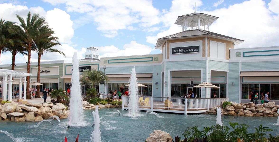 Front exterior of a home in the Abbott Square: The Townhomes community, located in Zephyrhills, FL (Image 9).