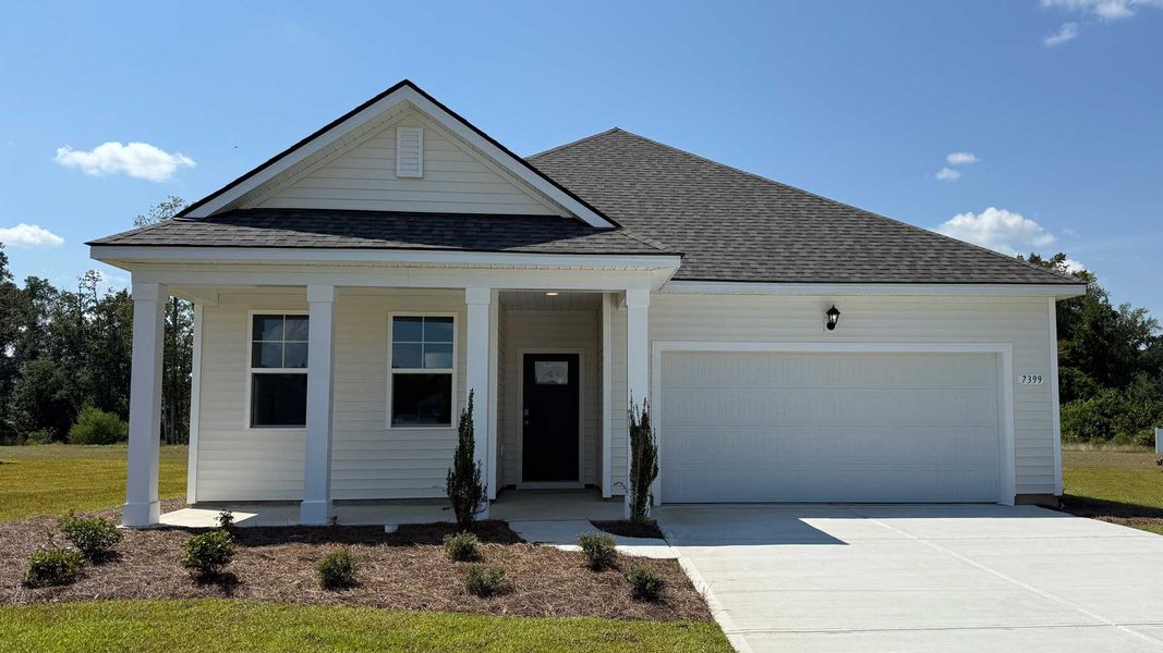 Front exterior of a home in the Meadow Walk community, located in Loris, SC (Image 1). Front exterior of a home in the Meadow Walk community, located in Loris, SC (Image 1).