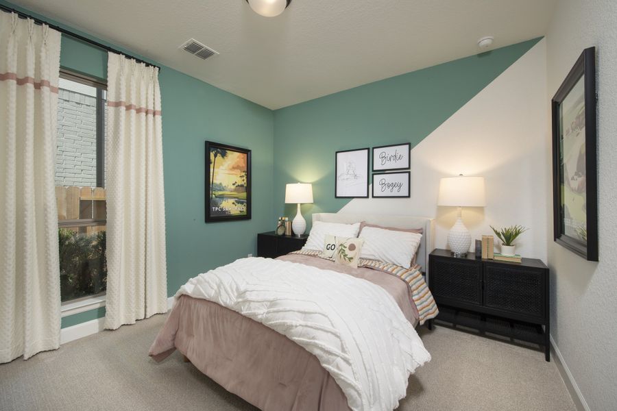 Furnished interior in a model home at The Highlands 45' in Porter (Image 15).