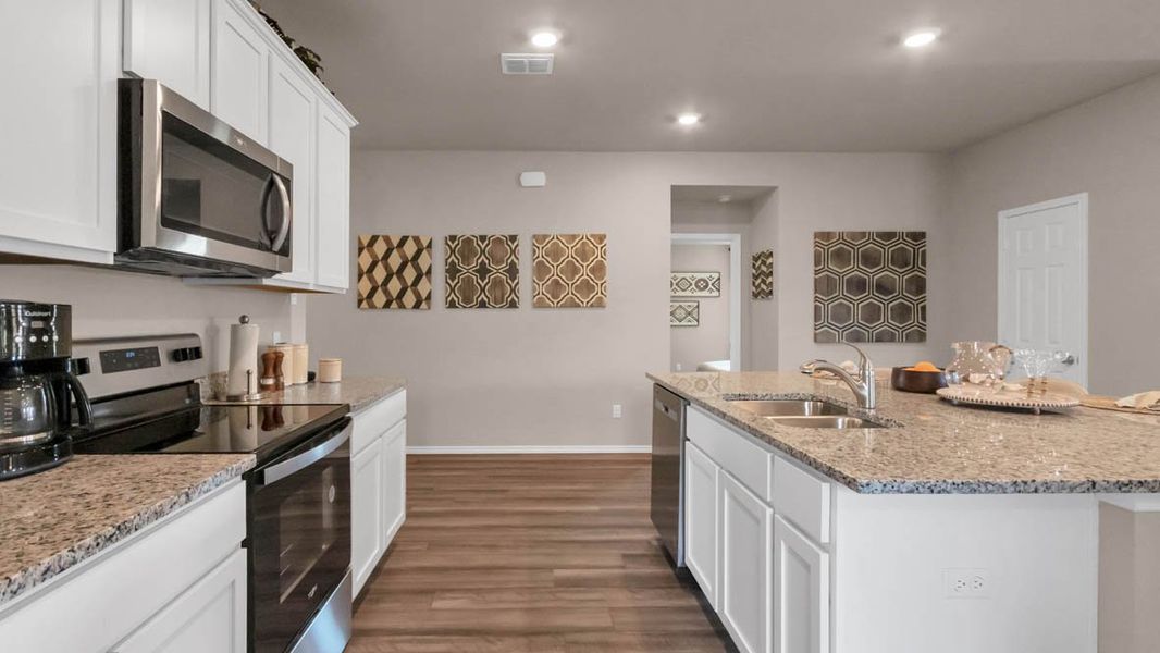 Furnished interior in a model home at Park Meadows in Lorena (Image 9).