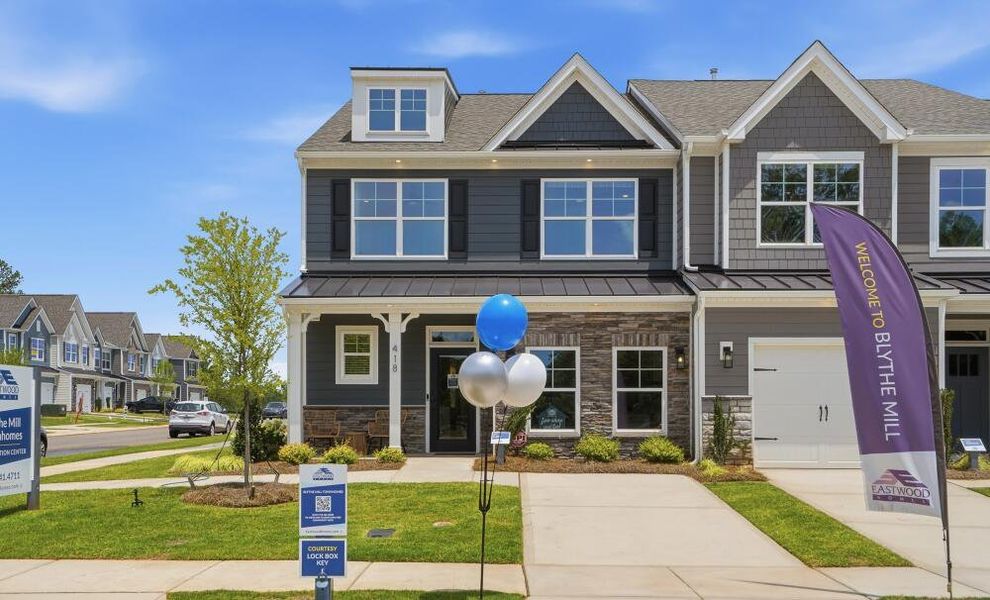Front exterior of a home in the Blythe Mill Townhomes community, located in Waxhaw, NC (Image 2). Front exterior of a home in the Blythe Mill Townhomes community, located in Waxhaw, NC (Image 2).