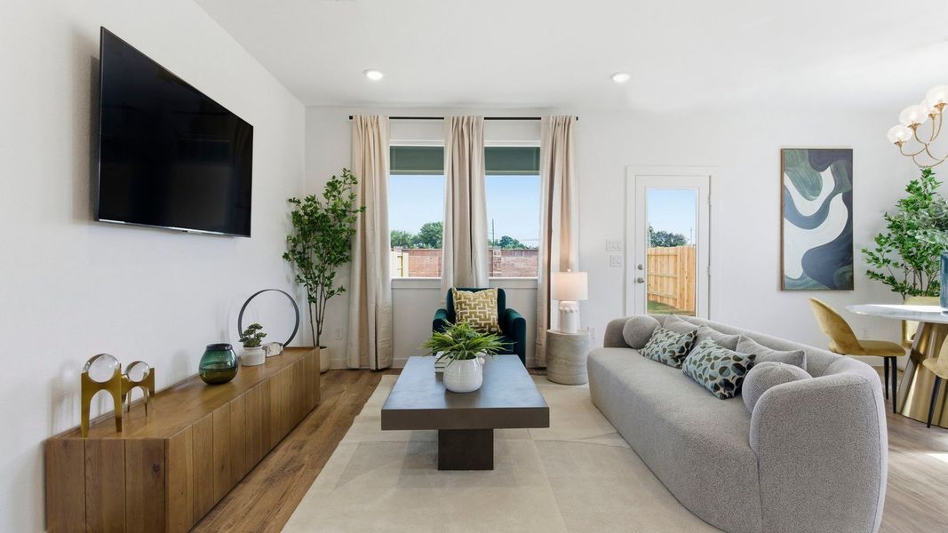Furnished interior in a model home at Murphy Village in Missouri City (Image 6).