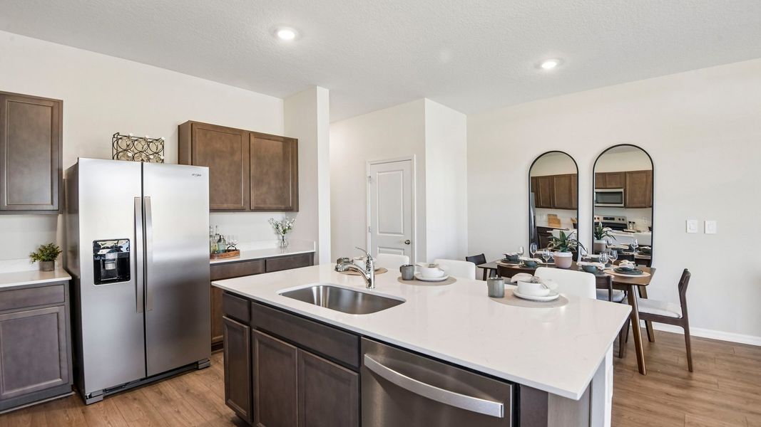Furnished interior in a model home at Sanctuary at Citrus Park Townhomes in Tampa (Image 8).