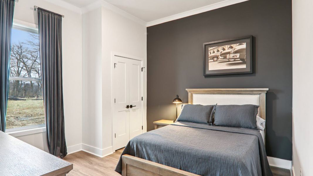 Furnished interior in a model home at Reserve at Tap Root Farms in Fletcher (Image 28).