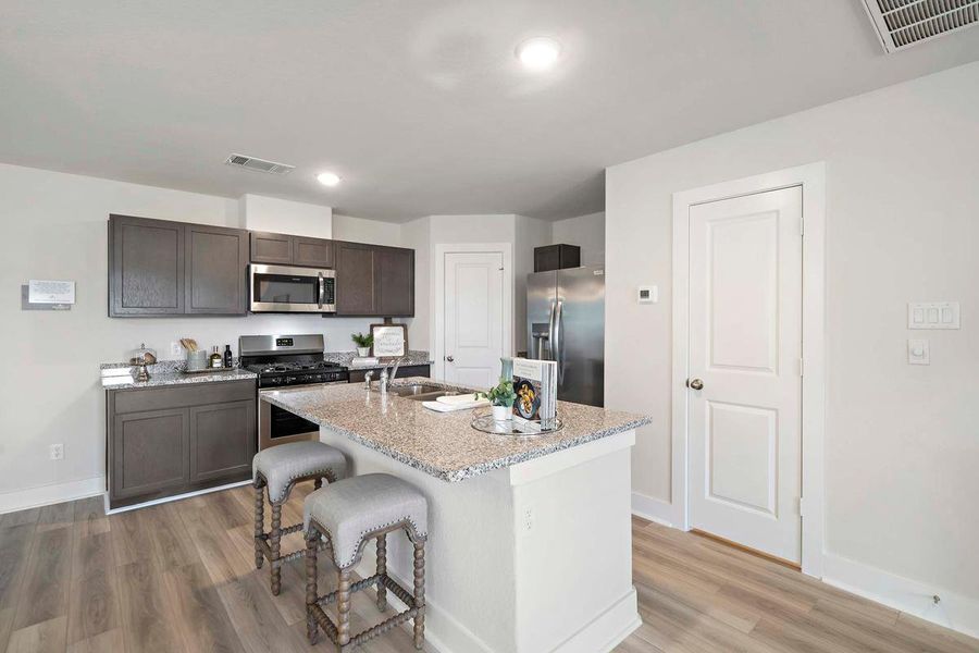 Furnished interior in a model home at Enclave at Cypress in Cypress (Image 12).