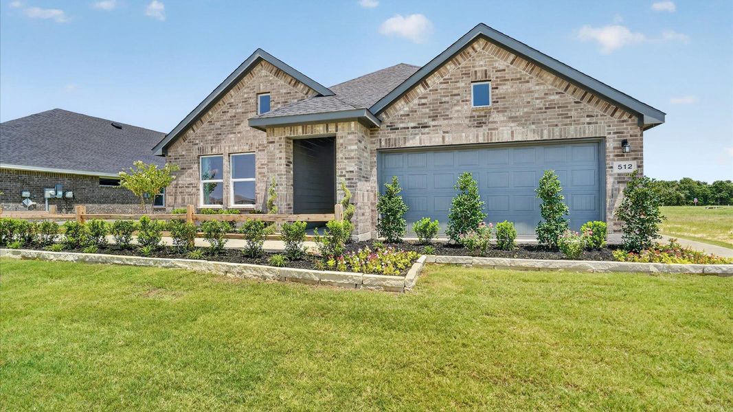 Front exterior of a home in the Saratoga community, located in Granbury, TX (Image 5).