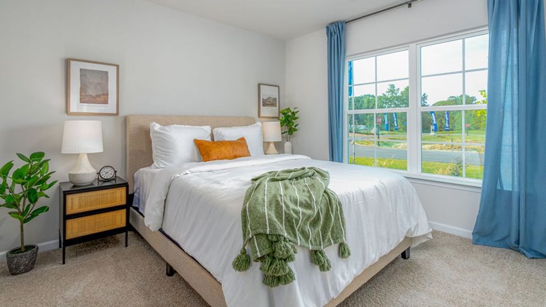 Furnished interior in a model home at Edinborough in Gibsonville (Image 25).