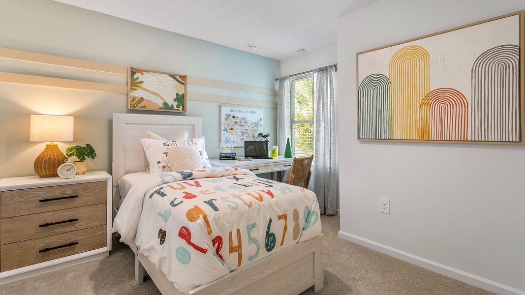 Furnished interior in a model home at Stokes Landing in St. Augustine (Image 19).