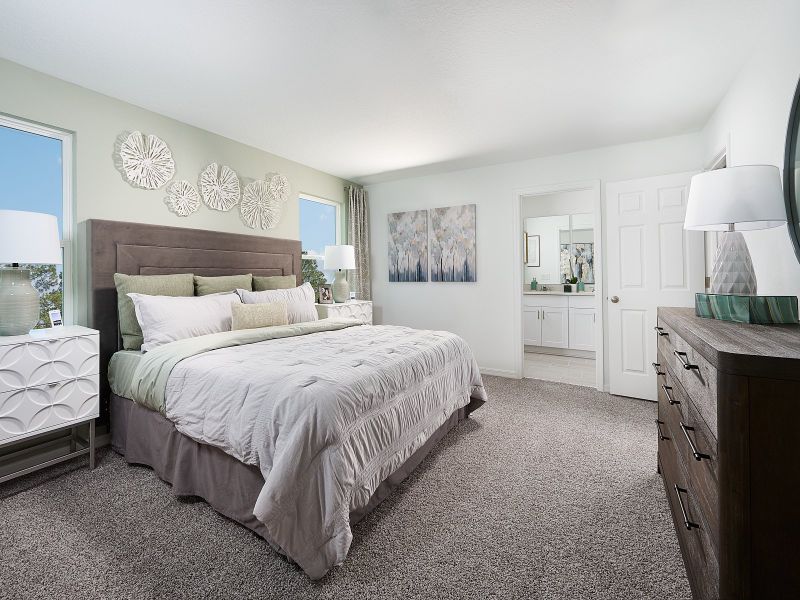 Primary bedroom in Windsor floorplan at The Meadow at Crossprairie