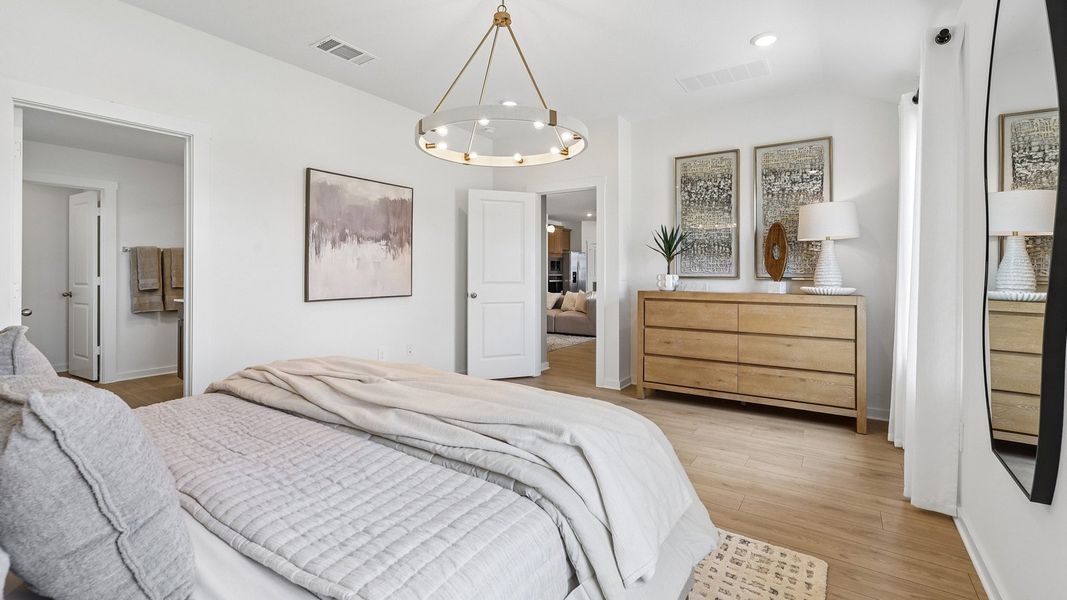 Furnished interior in a model home at Monarch Ranch in Manor (Image 29).
