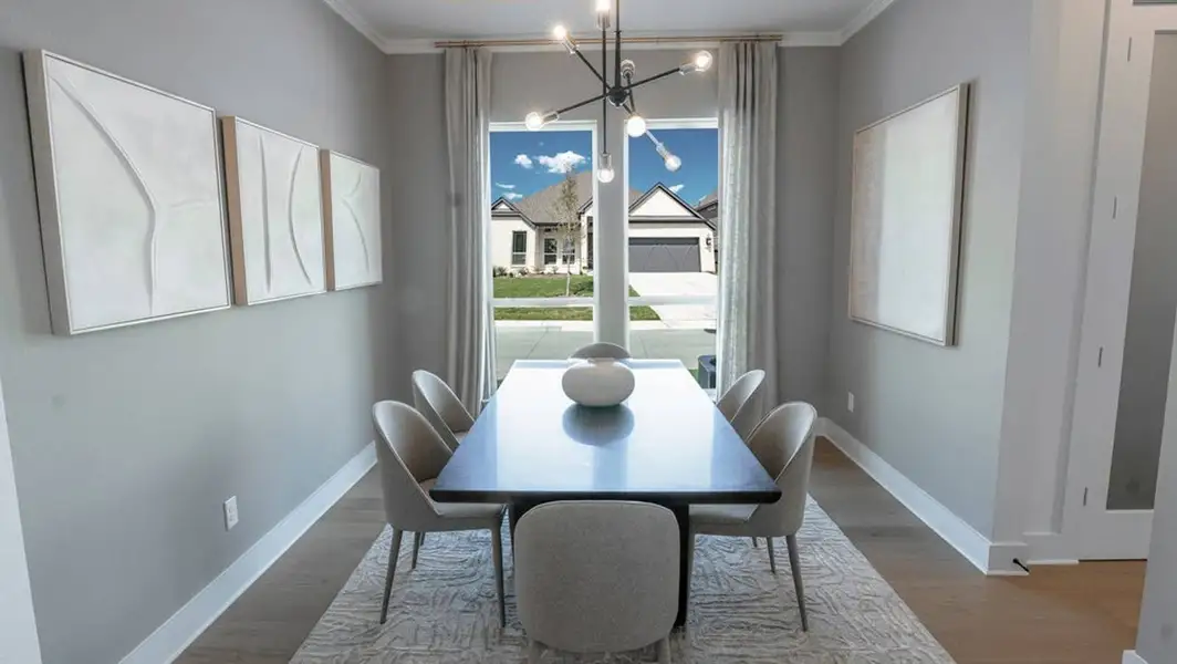 Furnished interior in a model home at Polo Ridge in Forney (Image 4).