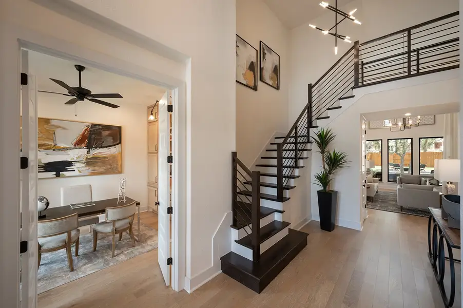 Furnished interior in a model home at 6 Creeks in Kyle (Image 7).