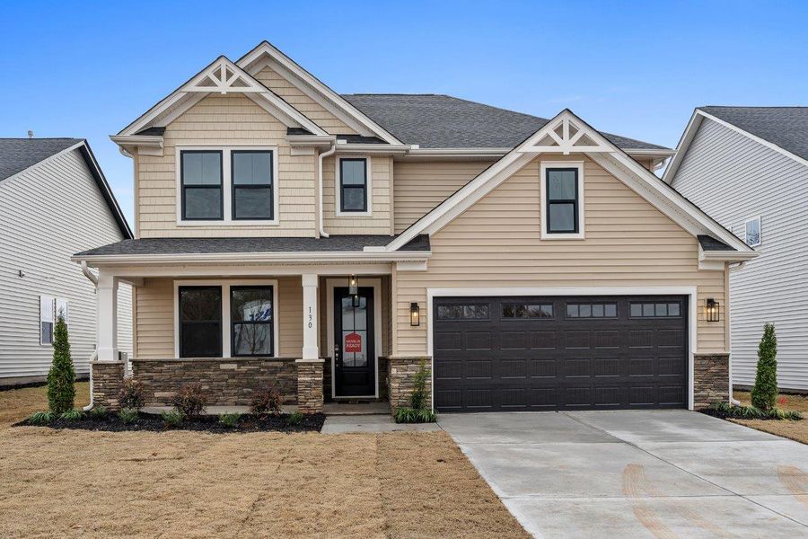 Front exterior of a home in the Eagle Creek community, located in Central, SC (Image 12).