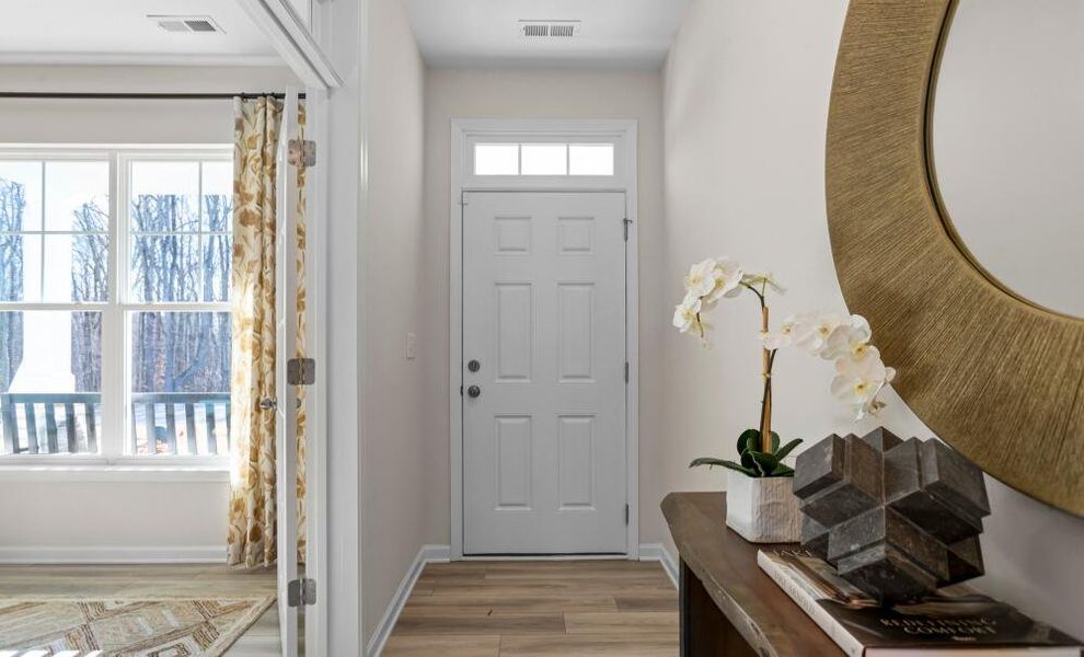 Furnished interior in a model home at Chandler Ridge in McLeansville (Image 3).