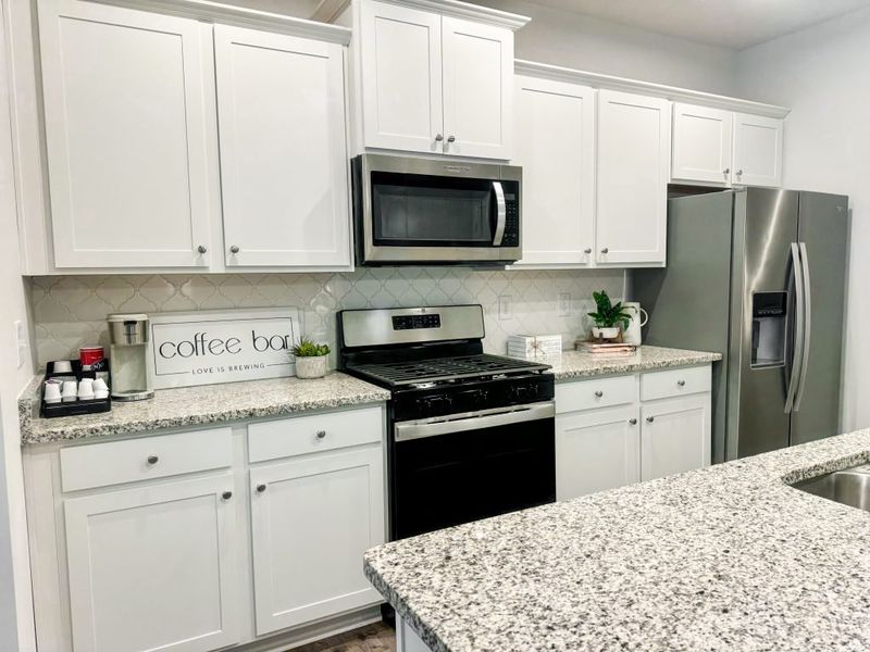 Furnished interior in a model home at Park View Reserve in Mableton (Image 17).