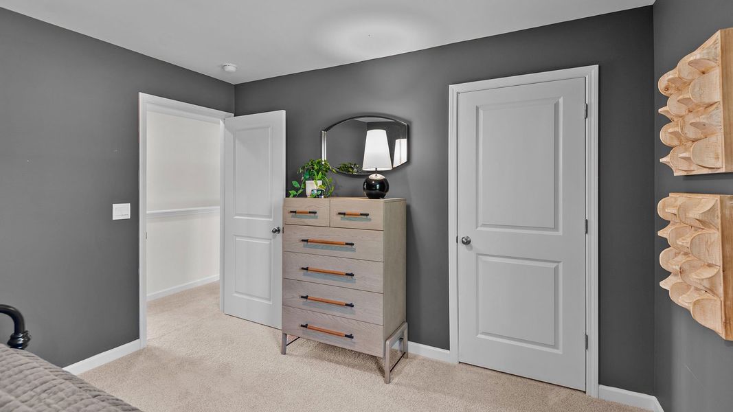 Furnished interior in a model home at The Preserve at Kinsley in Jamestown (Image 20).