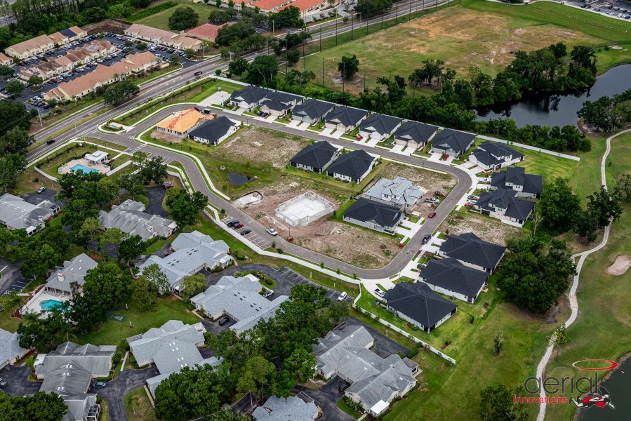 Aerial view of the Fairway Pointe - 55+ Villa Community community in Sun City Center, FL, showing layout and nearby surroundings (Image 8).